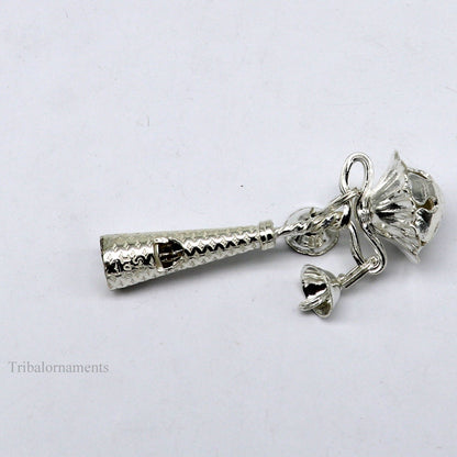 Handmade sterling silver baby Krishna gifting bells toy, silver whistle, and temple article, crafted by Tribal Ornaments.
