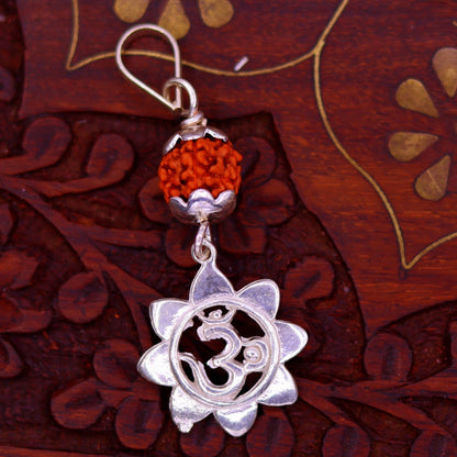 Solid sterling silver Aum pendant with natural rudraksha bead, unisex handmade tribal jewelry necklace by TRIBAL ORNAMENTS.