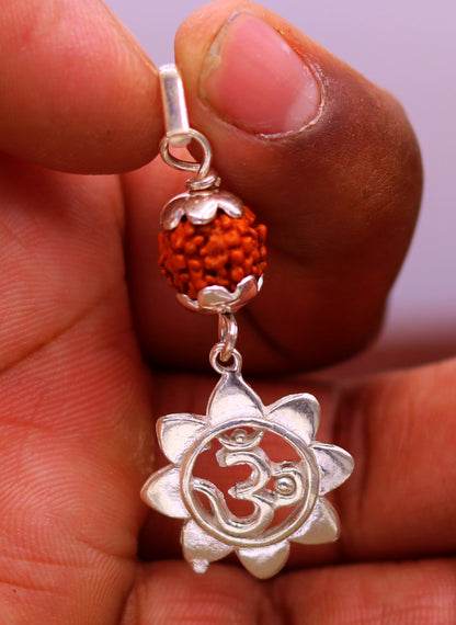 Sterling silver Aum pendant with natural rudraksha bead, unisex handmade tribal jewelry necklace by TRIBAL ORNAMENTS.