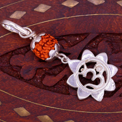 Sterling silver Aum pendant with natural rudraksha bead, unisex tribal jewelry, handcrafted and stylish for modern wear.