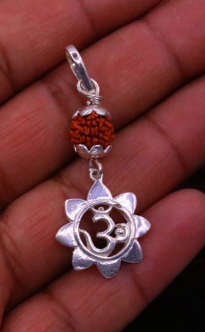 Solid sterling silver Aum pendant with natural rudraksha bead, unisex tribal jewelry, handmade and stylish necklace accessory.