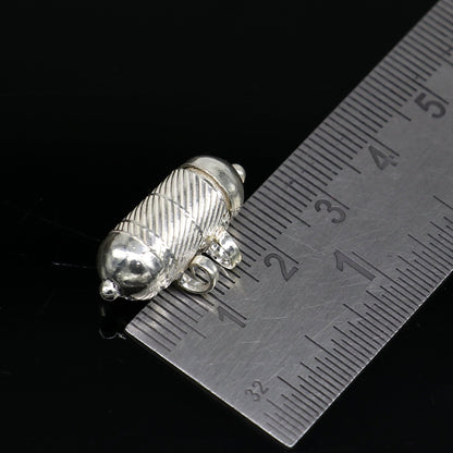 Solid sterling silver round amulet box pendant with engraved tribal design, handmade mantra box jewelry by TRIBAL ORNAMENTS.