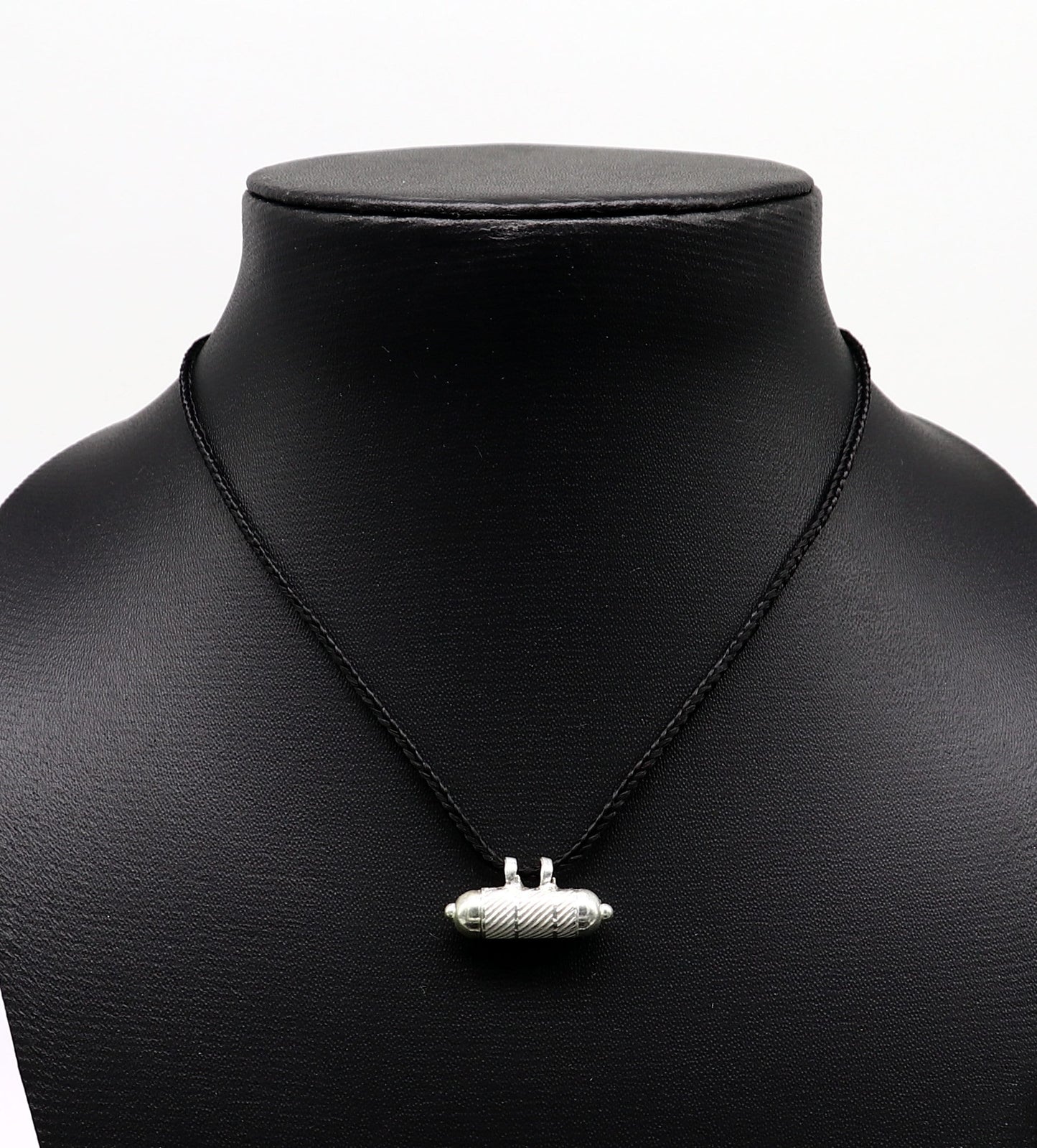 Solid sterling silver vintage amulet box pendant with round shape, tribal-inspired mantra and kavacham design, handmade tribal jewelry