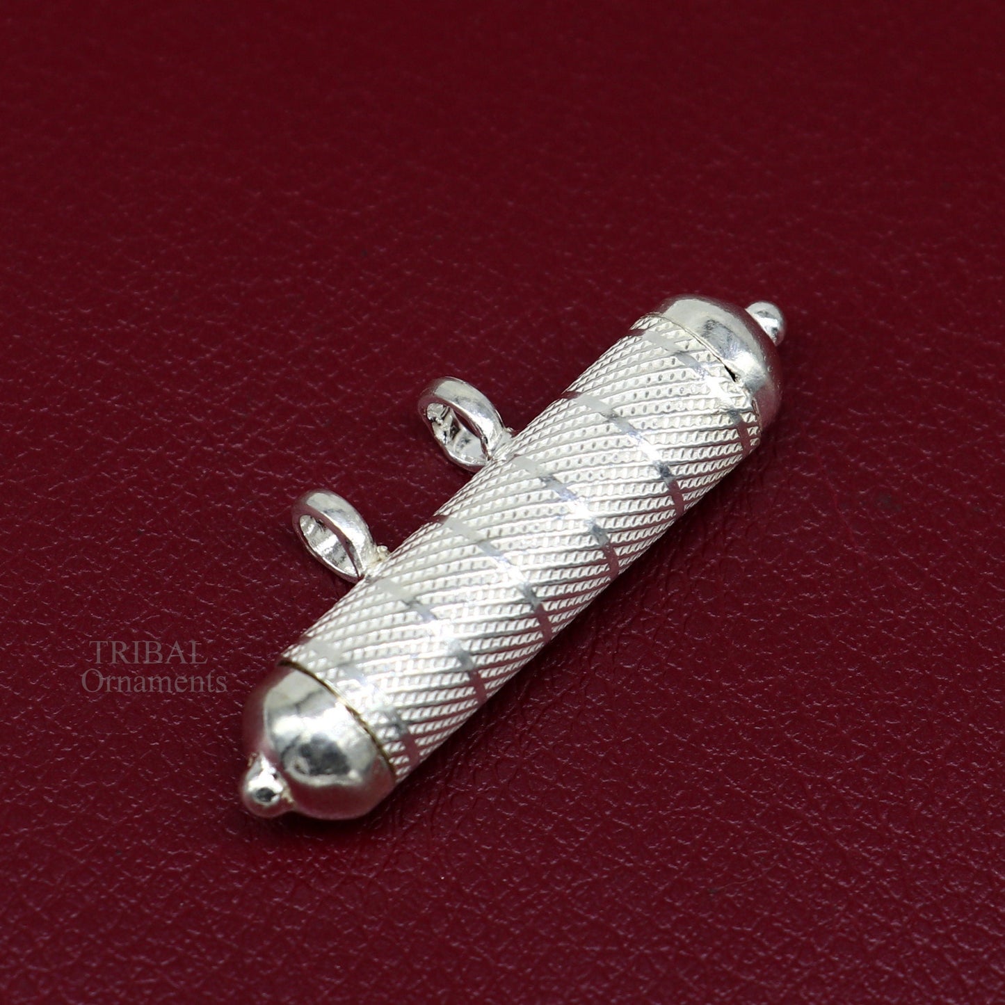 Solid sterling silver round amulet box pendant with intricate handmade design, ideal for mantra or talisman jewelry.