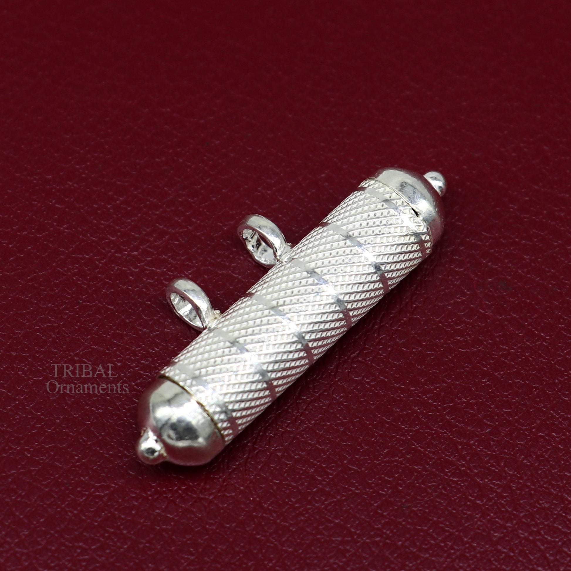 Solid sterling silver round amulet box pendant with intricate handmade design, ideal for mantra or talisman jewelry.