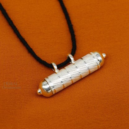 Solid sterling silver round amulet box pendant with intricate design, handmade mantra box and tribal jewelry style.