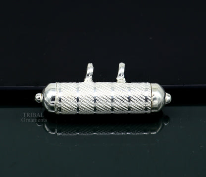 Solid sterling silver round amulet box pendant with handcrafted tribal design, featuring mantra and mascot motifs.