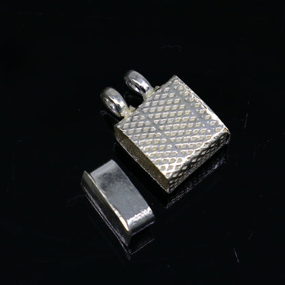 Solid sterling silver square amulet box pendant by Tribal Ornaments, handcrafted with detailed design for spiritual protection.