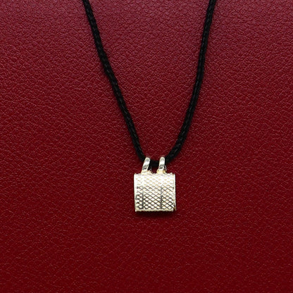 Solid sterling silver square amulet box pendant by Tribal Ornaments, handcrafted with intricate design for protection and spirituality.