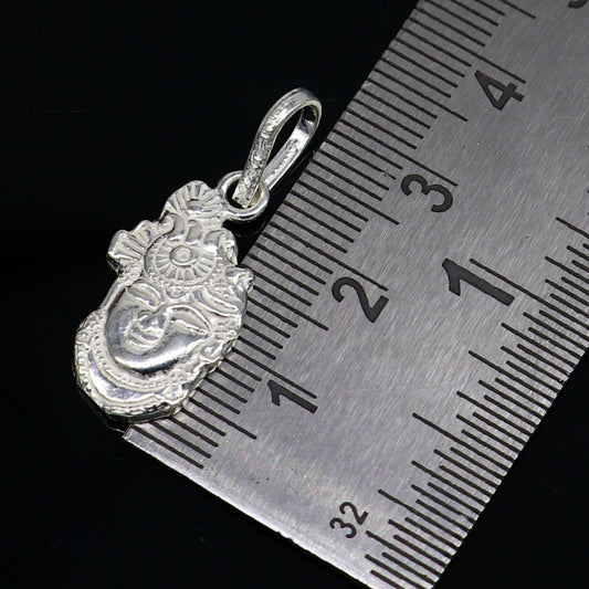 Solid sterling silver Lord Krishna Shreenathji tiny pendant, handmade unisex Hindu jewelry, detailed tribal design by TRIBAL ORNAMENTS.