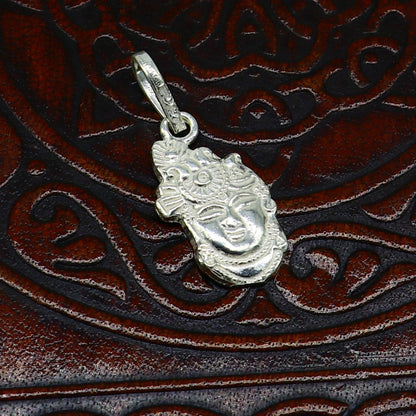 Sterling silver Lord Krishna Shreenathji tiny pendant, handmade unisex Hindu jewelry, detailed tribal design, perfect for gifting.