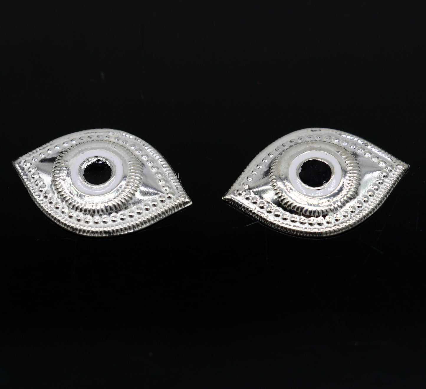 Solid sterling silver Netra eyes for Lord Jagannath and Laddu Gopala idols, crafted by TRIBAL ORNAMENTS.