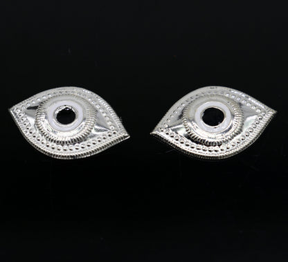 Solid sterling silver Netra eyes for Lord Jagannath and Laddu Gopala idols, crafted by TRIBAL ORNAMENTS.