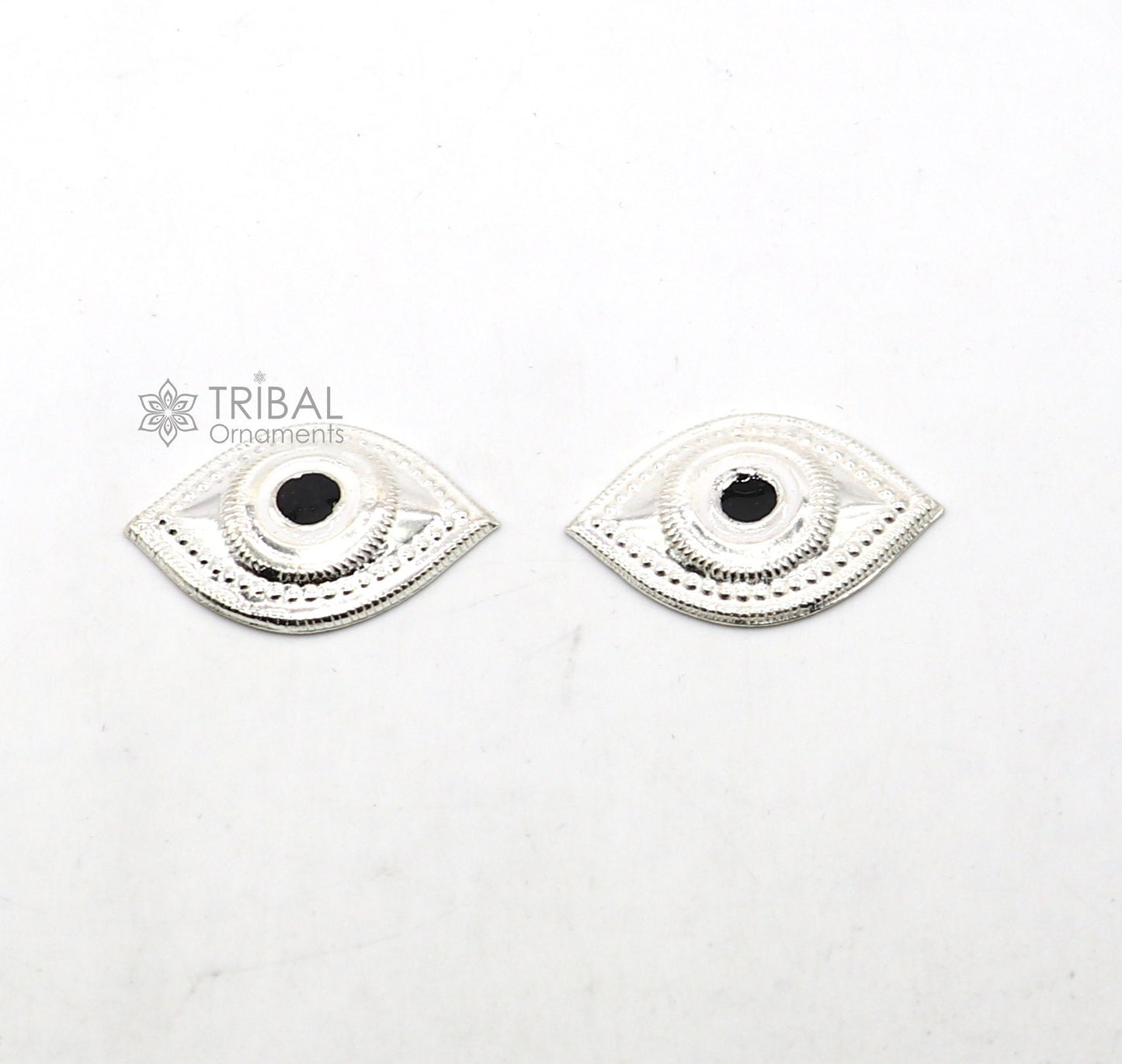 Solid sterling silver Netra eyes for Lord Jagannath and Laddu Gopala idols, crafted by TRIBAL ORNAMENTS.