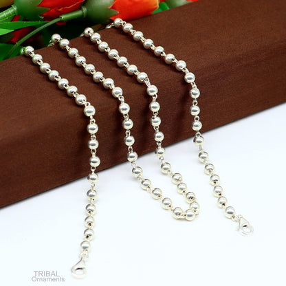 Sterling silver face mask and eyeglass chain necklace for women, stylish and functional accessory with tribal design details.