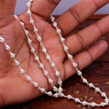 Sterling silver handmade basil rosary necklace with wooden beads and silver chain, ideal for Ayurveda meditation and spiritual use.