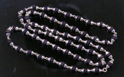 Sterling silver handmade black basil rosary necklace with wooden beads and silver chain, ideal for Ayurveda meditation and prayer.