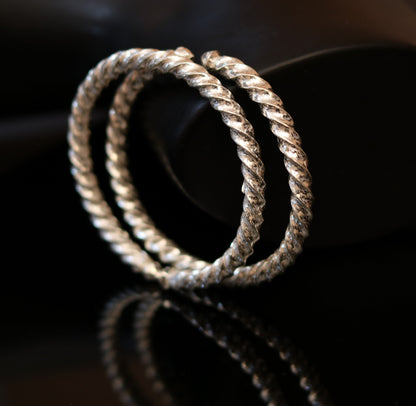 Sterling silver adjustable baby bangle bracelet from Tribal Ornaments, handmade unisex silver jewelry for kids.