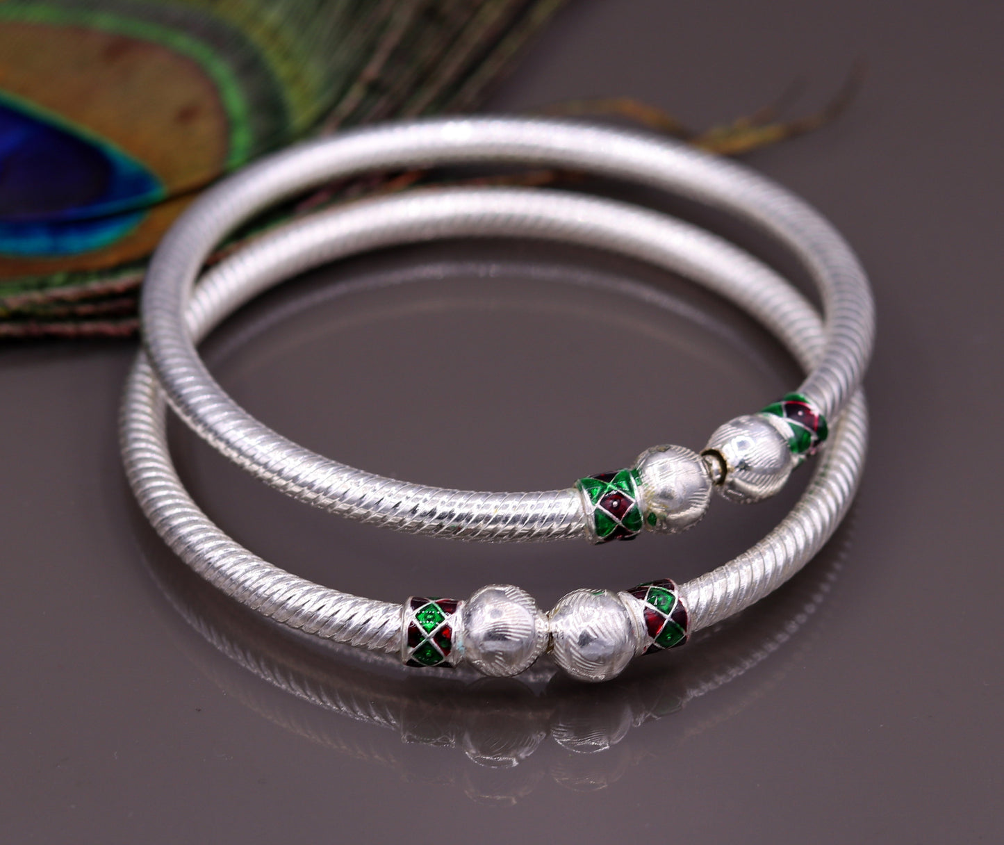 Sterling silver handmade vintage bangle bracelet pair with antique tribal design, ideal for belly dance jewelry from Rajasthan, India.