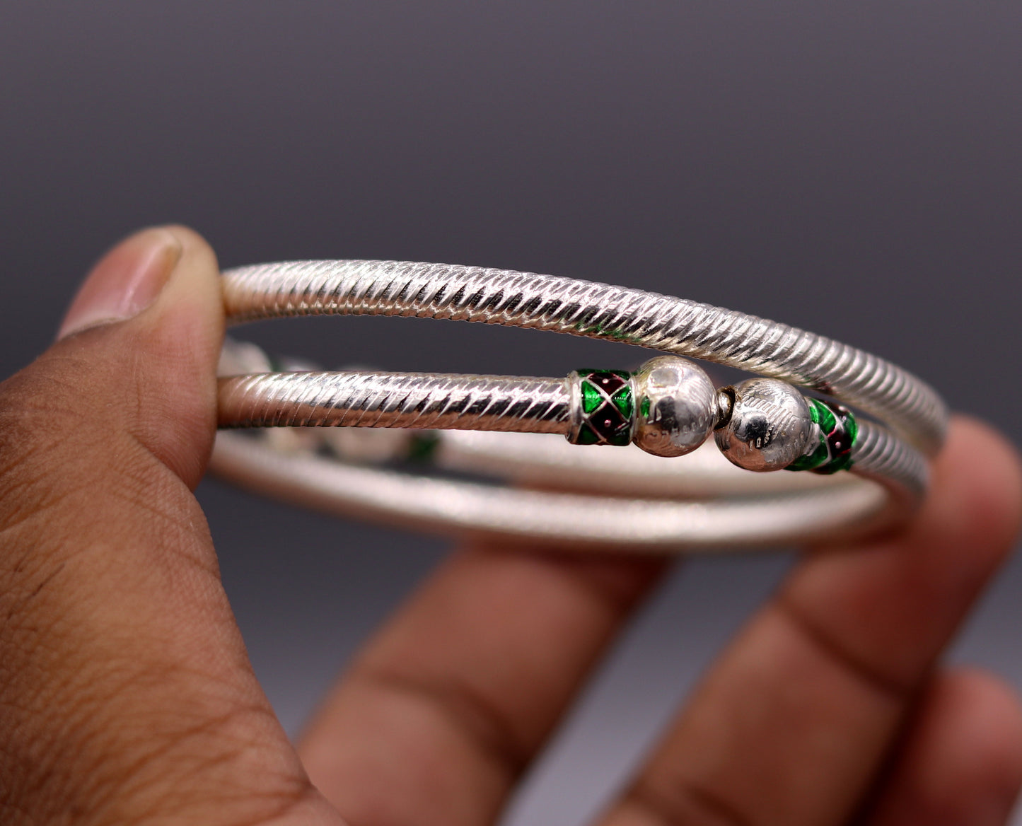 Sterling silver handmade vintage bangle bracelet pair with antique tribal design, perfect for belly dance jewelry from Rajasthan, India.