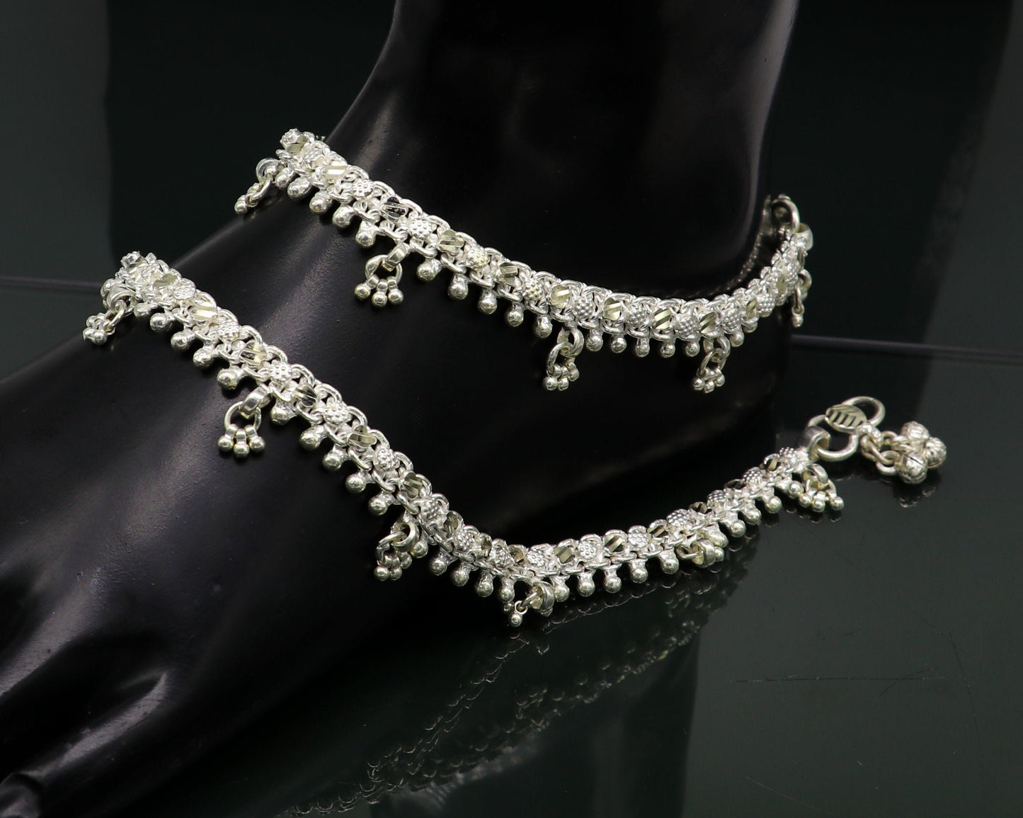 Sterling silver tribal ankle bracelet with vintage antique design, customized and genuine jewelry for foot and ankle adornment.
