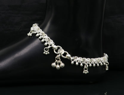 Sterling silver tribal ankle bracelet with vintage custom design, featuring intricate antique-style patterns and genuine jewelry craftsmanship.