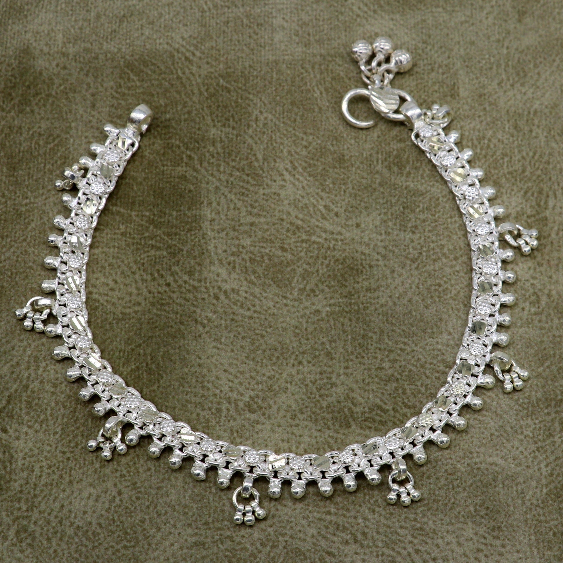 Sterling silver tribal ankle bracelet with vintage antique design, customized details, and genuine jewelry craftsmanship.