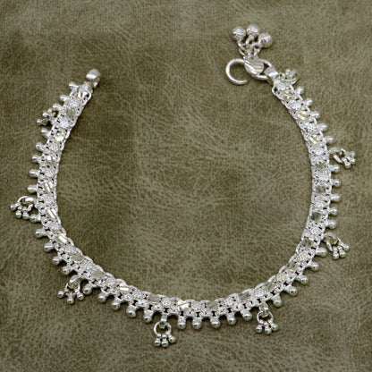 Sterling silver tribal ankle bracelet with vintage antique design, customized details, and genuine jewelry craftsmanship.