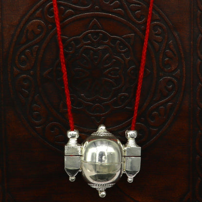 Sterling silver vintage Shiva Lingam box pendant with intricate tribal design, stylish antique casket-style jewelry from Tribal Ornaments.