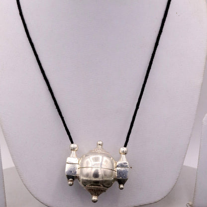 Sterling silver vintage Lord Shiva Lingam pendant with mantra box, tribal-style custom jewelry by TRIBAL ORNAMENTS.