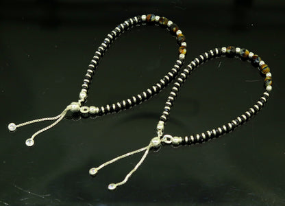 Sterling silver beaded bracelet with black onyx stone and Nazariya charm, adjustable jewelry for girls by Tribal Ornaments.