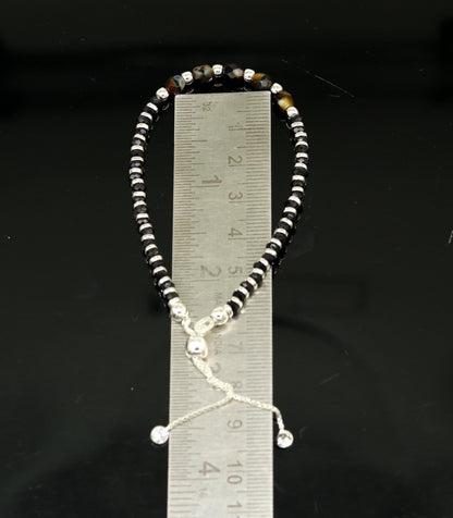 Sterling silver beaded bracelet with black onyx stone and Nazariya charm, adjustable jewelry for girls by Tribal Ornaments.