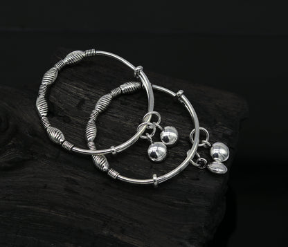 Sterling silver designer baby adjustable bangles bracelet with charming charms, handmade by TRIBAL ORNAMENTS.