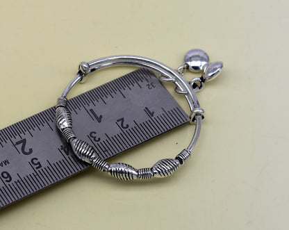 Sterling silver baby adjustable bangles bracelet with stylish designer charms, handmade by Tribal Ornaments for kids.