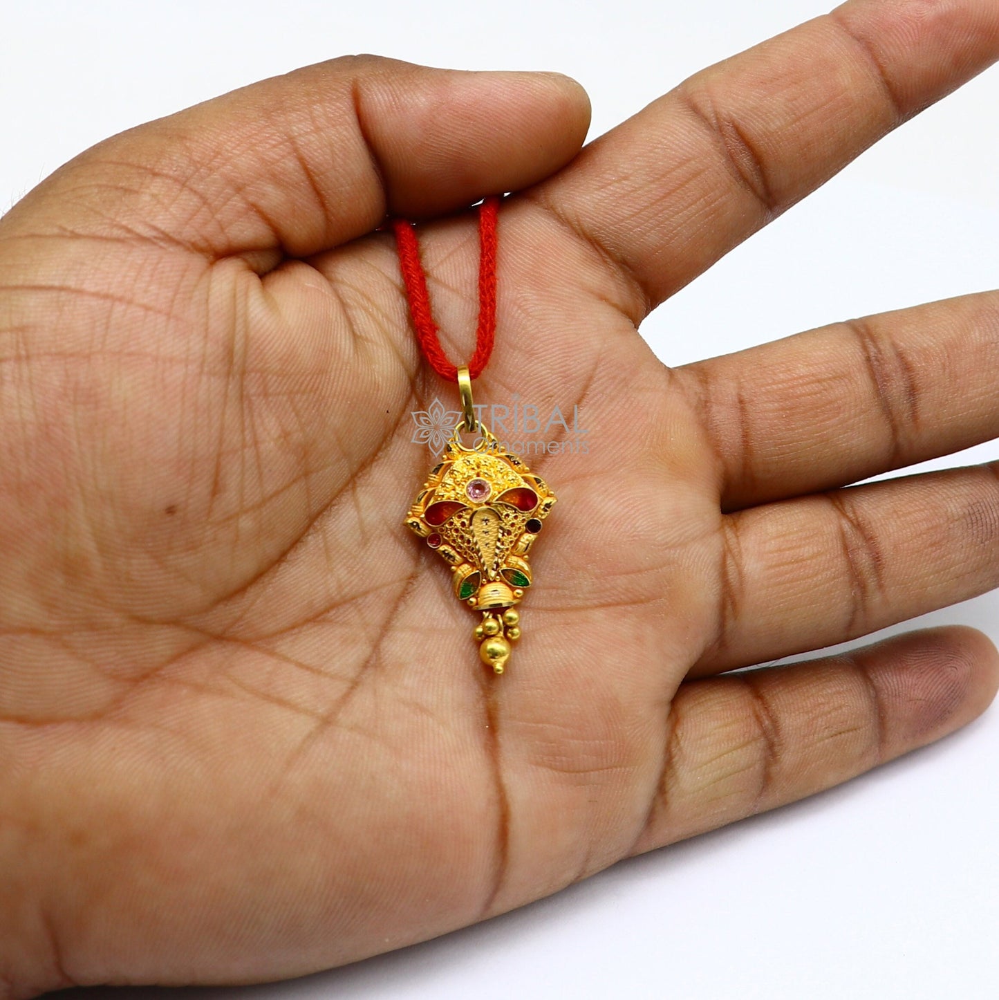 Traditional 22KT yellow gold filigree work pendant by TRIBAL ORNAMENTS, showcasing intricate ethnic bridal jewelry design.