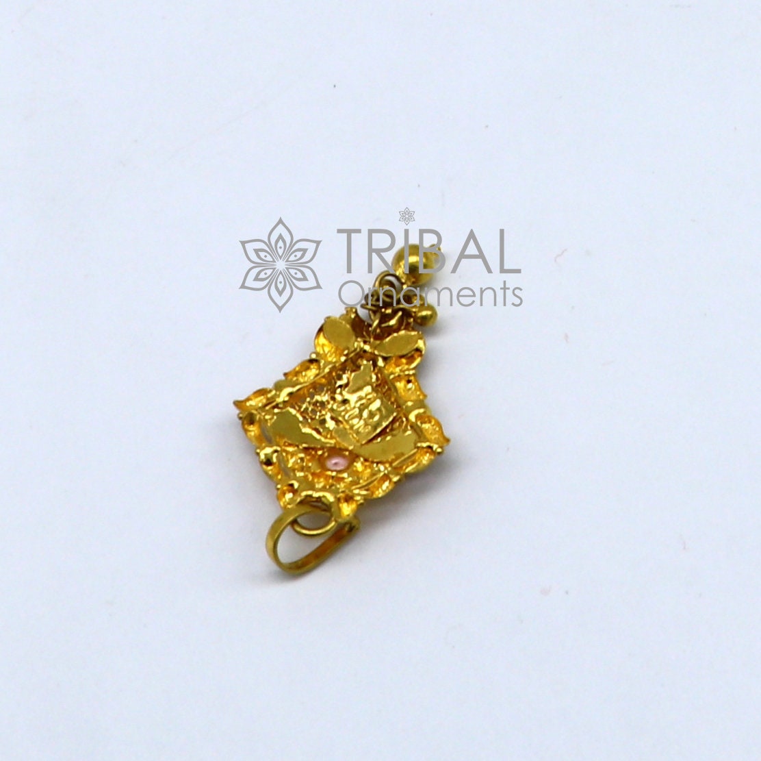 Traditional 22KT yellow gold filigree pendant by TRIBAL ORNAMENTS, showcasing intricate ethnic bridal jewelry design.