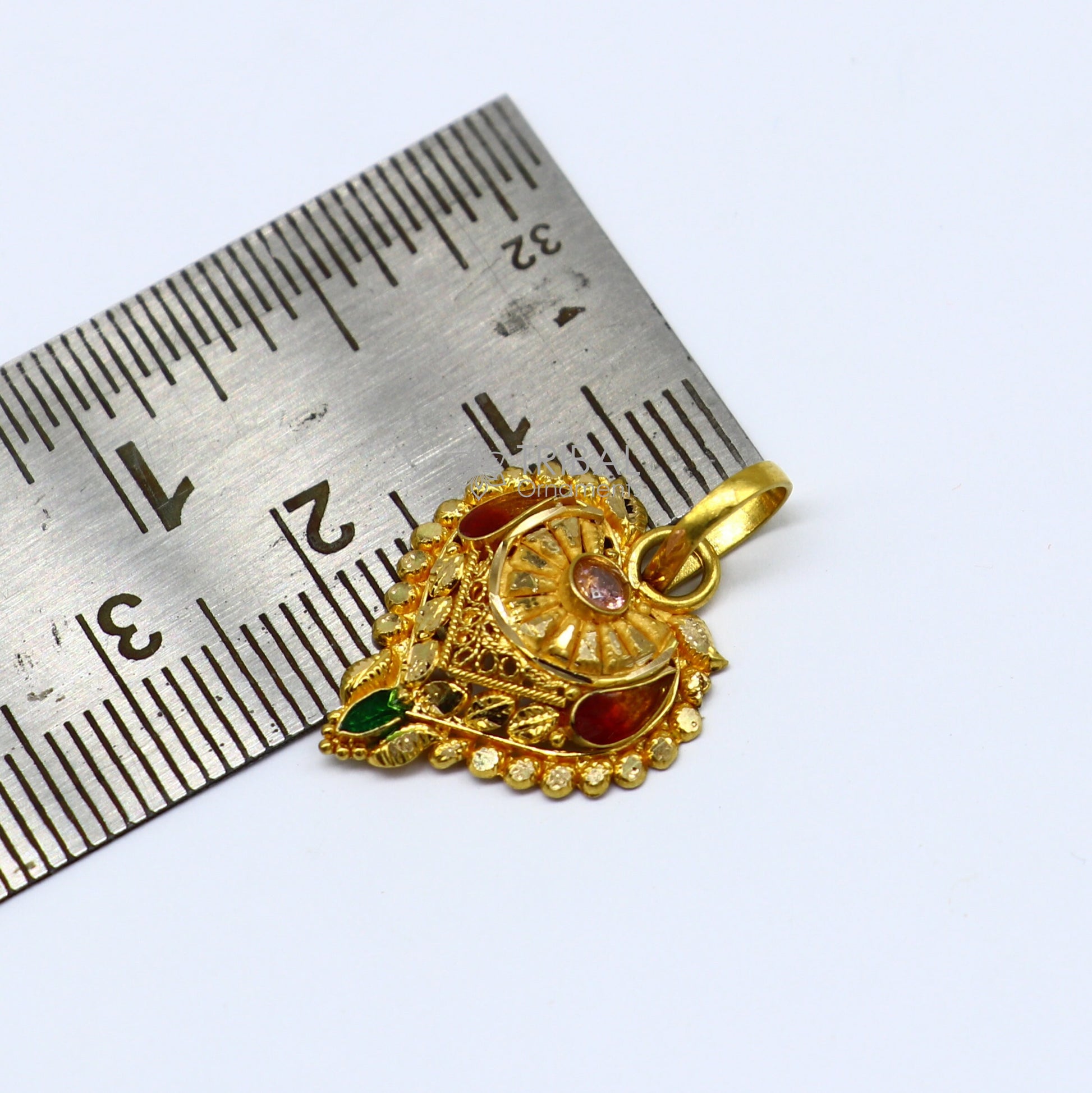 Traditional 22KT yellow gold filigree ethnic pendant, showcasing intricate craftsmanship for trendy bridal jewelry.