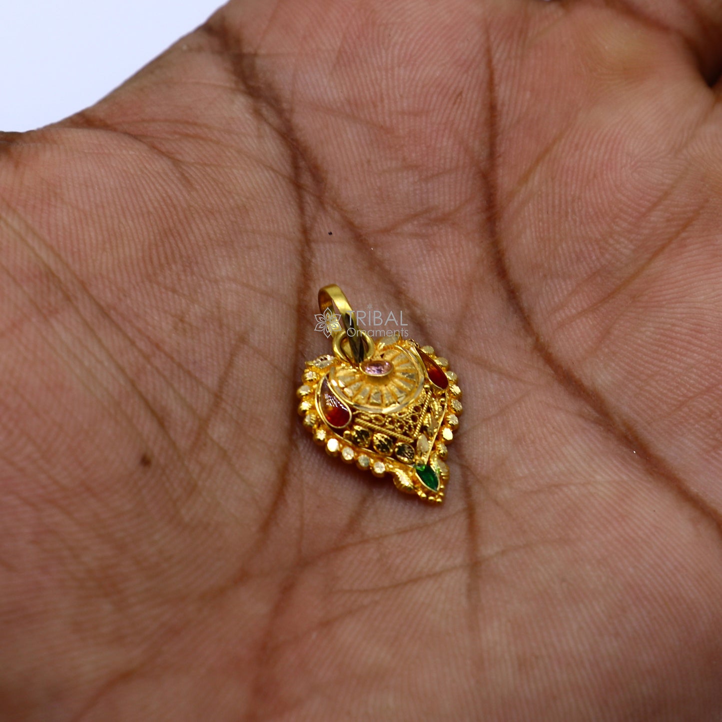 Traditional 22KT yellow gold filigree ethnic pendant by TRIBAL ORNAMENTS, featuring intricate design for bridal jewelry.