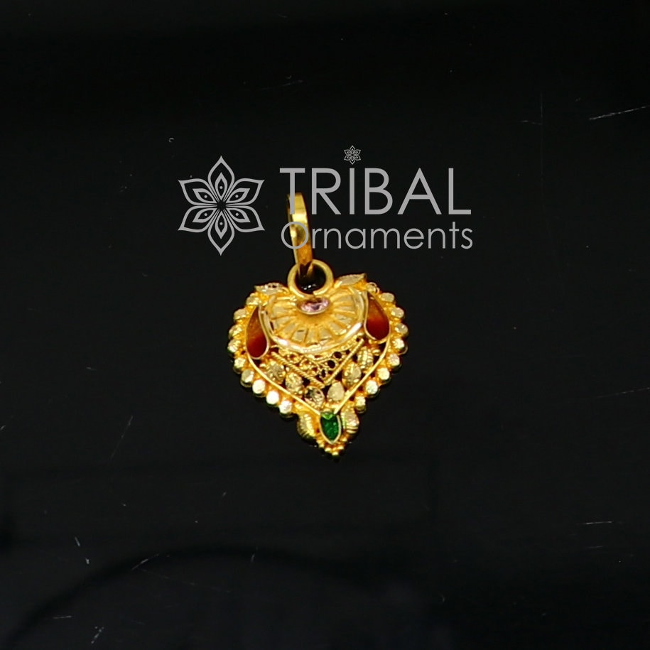 Traditional 22KT yellow gold filigree ethnic pendant by TRIBAL ORNAMENTS, featuring intricate tribal jewelry design.
