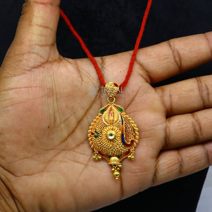 Traditional 22KT yellow gold handcrafted filigree pendant by Tribal Ornaments, ethnic bridal jewelry with intricate design.