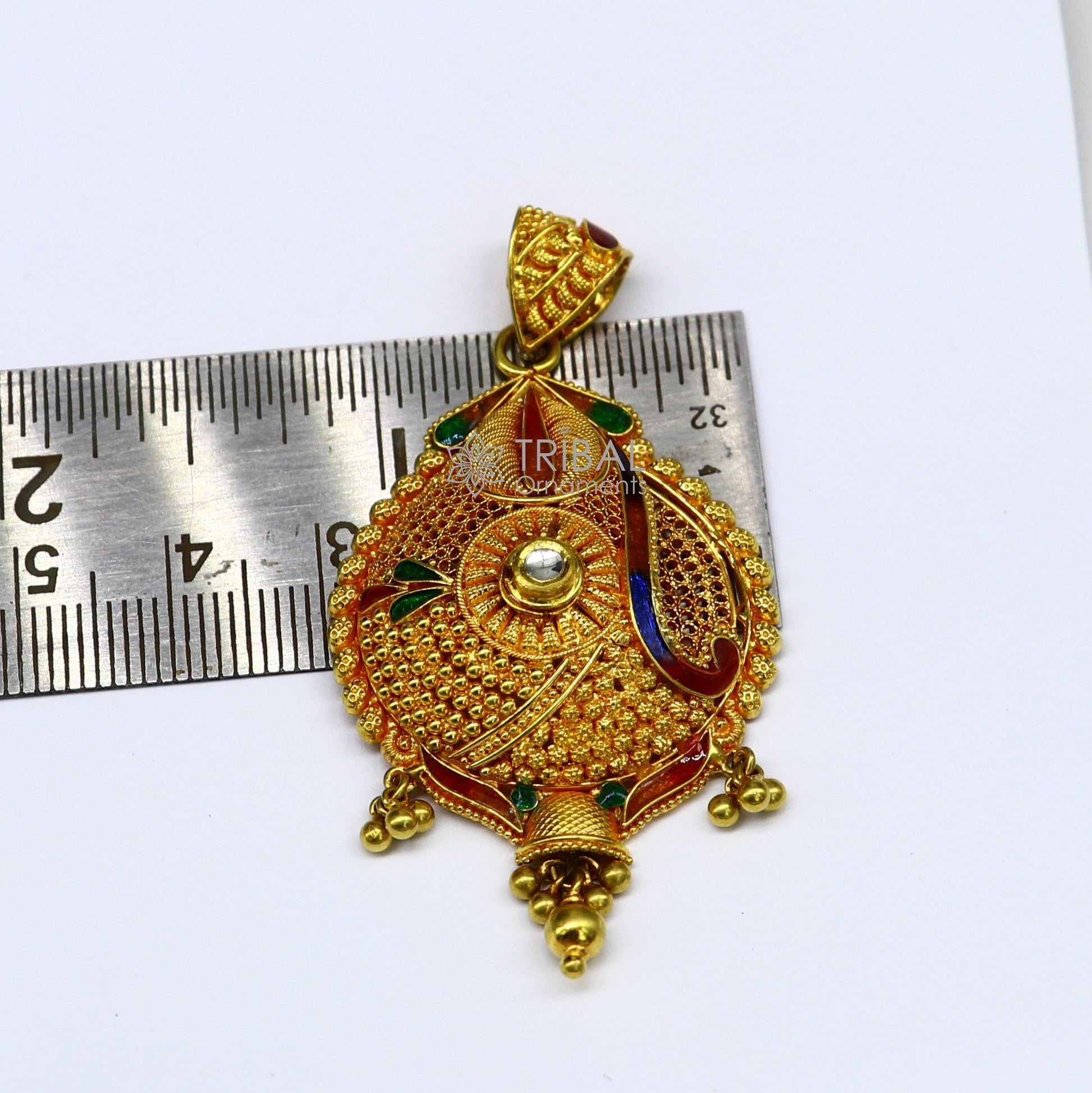 Traditional 22KT yellow gold filigree pendant by TRIBAL ORNAMENTS, handmade ethnic bridal jewelry with intricate designs.