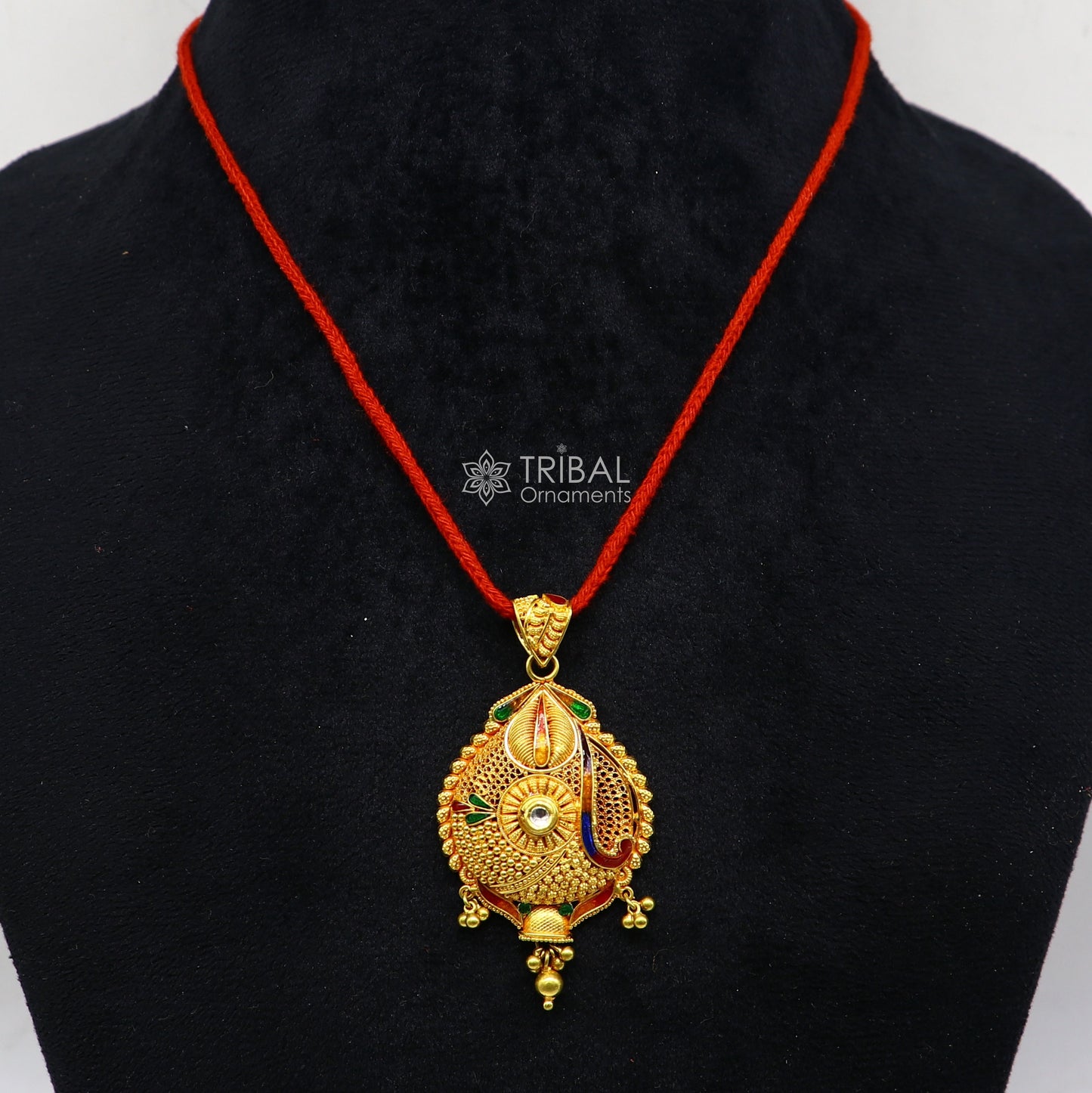 Traditional 22KT yellow gold filigree pendant by TRIBAL ORNAMENTS, showcasing intricate handmade ethnic bridal jewelry design.