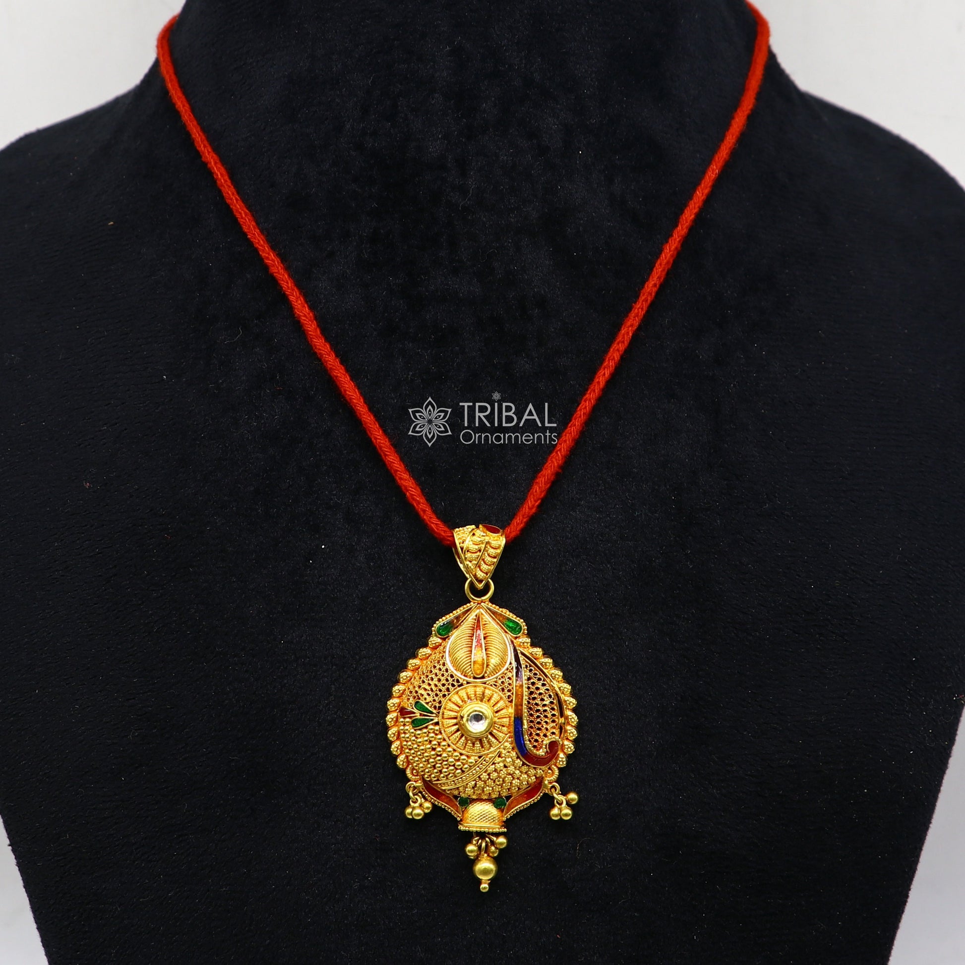 Traditional 22KT yellow gold filigree pendant by TRIBAL ORNAMENTS, showcasing intricate handmade ethnic bridal jewelry design.