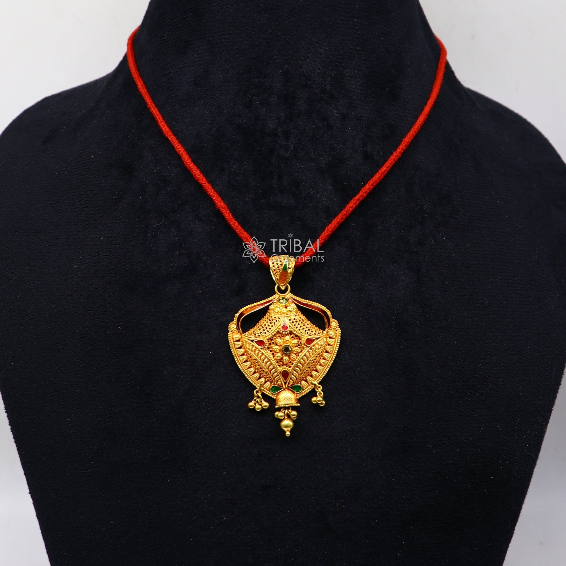 Traditional 22KT yellow gold filigree pendant by TRIBAL ORNAMENTS, showcasing intricate handmade ethnic bridal jewelry design.