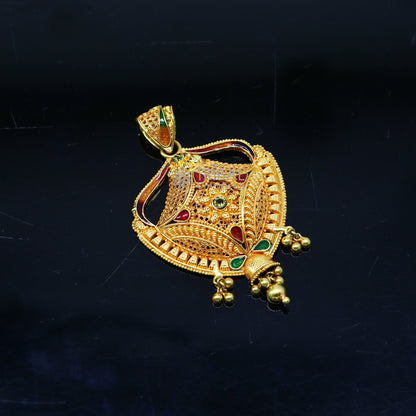 Traditional 22KT yellow gold filigree work pendant by TRIBAL ORNAMENTS, showcasing intricate handmade ethnic bridal jewelry design.