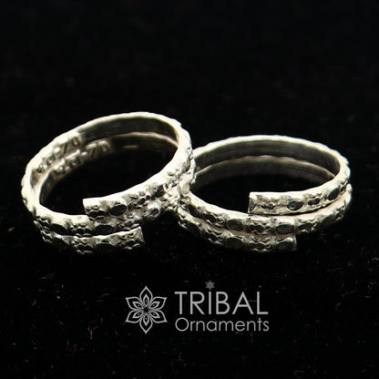 Handmade silver toe ring with spiral design, traditional tribal jewelry from India, crafted by TRIBAL ORNAMENTS.