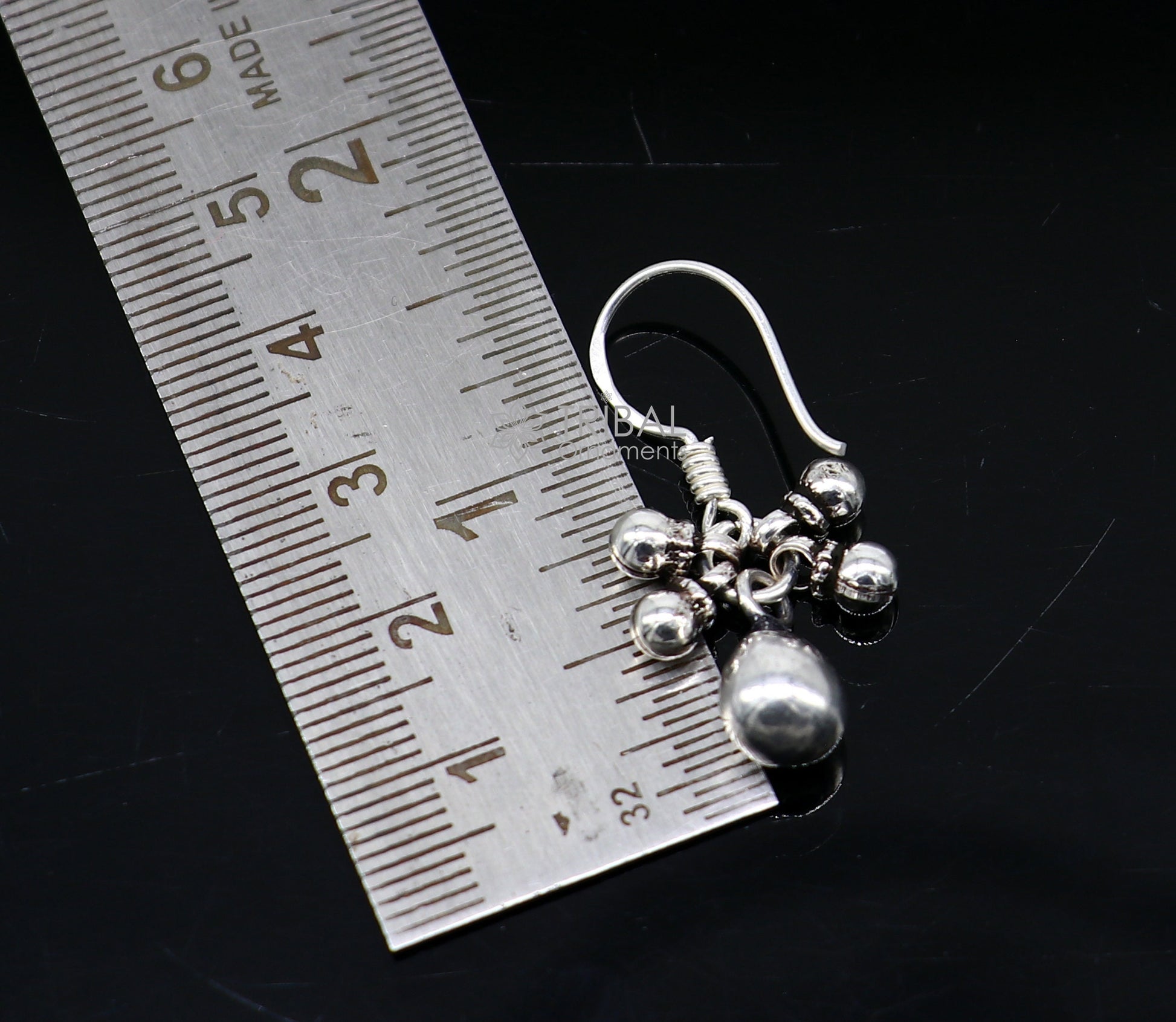 Traditional tribal-style 925 sterling silver hoop earrings with hanging drop dangles, customized and trendy tribal jewelry.