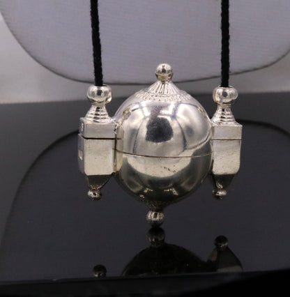 Handmade silver Shiva Lingam amulet pendant with traditional tribal design, prayer and mantra box from Rajasthan India.