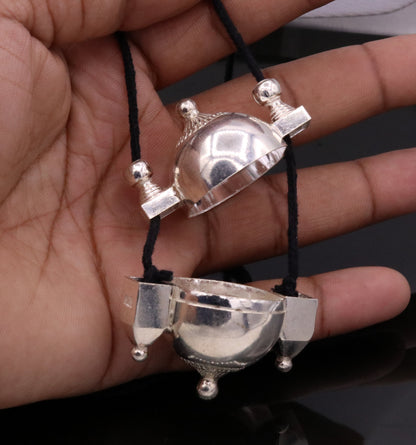 Silver Shiva Lingam box amulet pendant with traditional tribal design, handmade prayer box jewelry from Rajasthan, India.