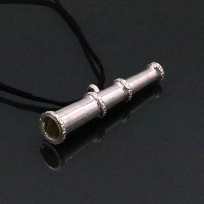 Traditional tribal design sterling silver unisex pendant jewelry from Rajasthan, featuring antique style tribal ornament.